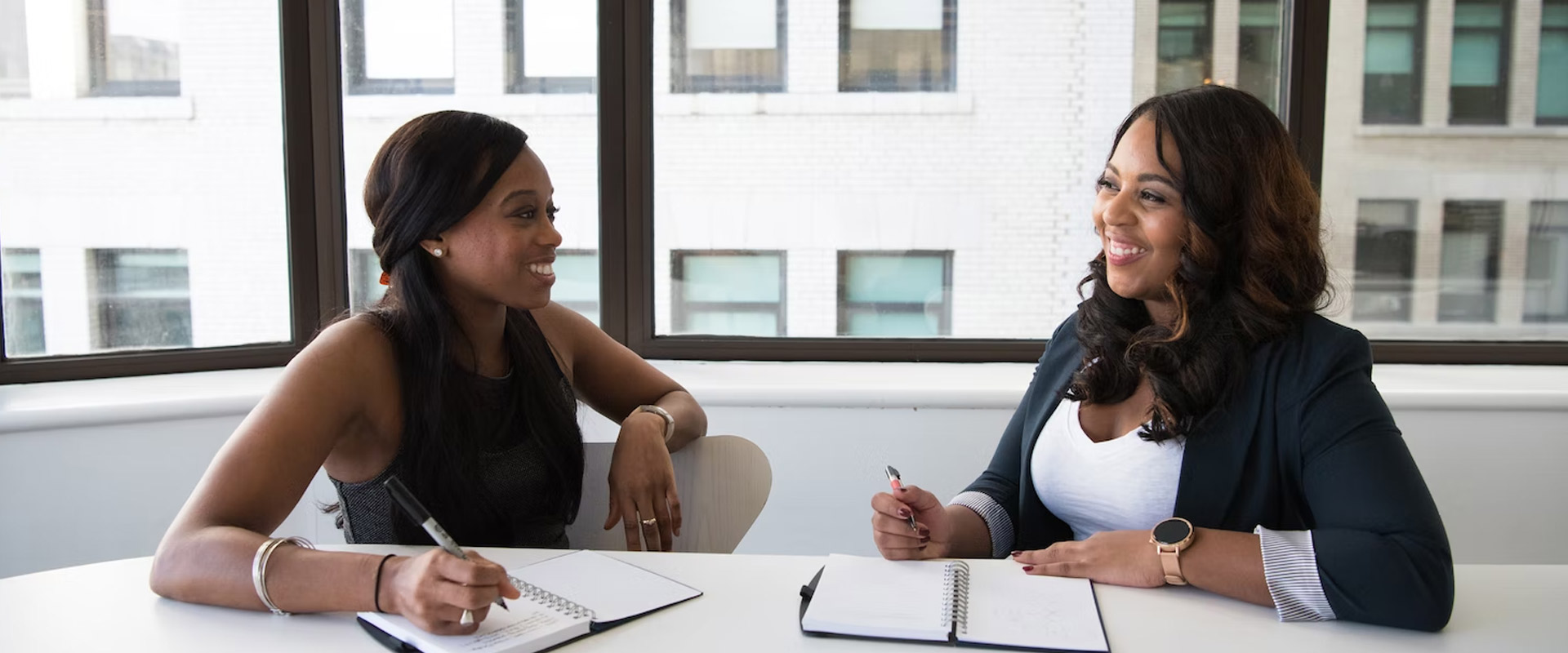 Two business women in meeting